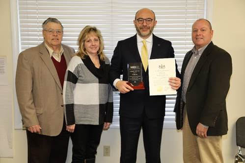 WEDCO officers present the 2021 Innovator of the Year Award to Nicola Pilone, president and CEO of PTubes, Inc., Honesdale.  Shown are Tony Herzog, left, Tina Diehl, Nicola Pilone and Wayne Stephens.